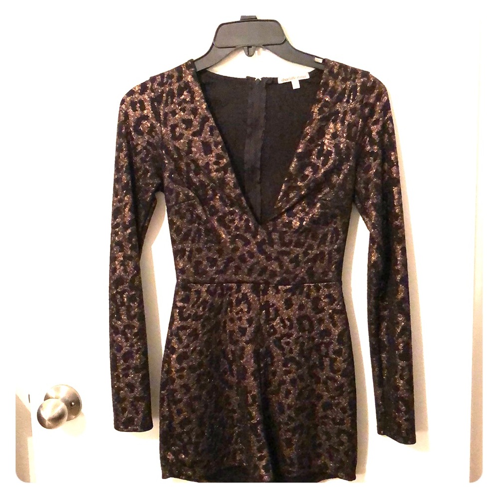 Cheetah long sleeve romper